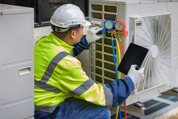 Professional Ductwork Repair technician working in Still River, MA
